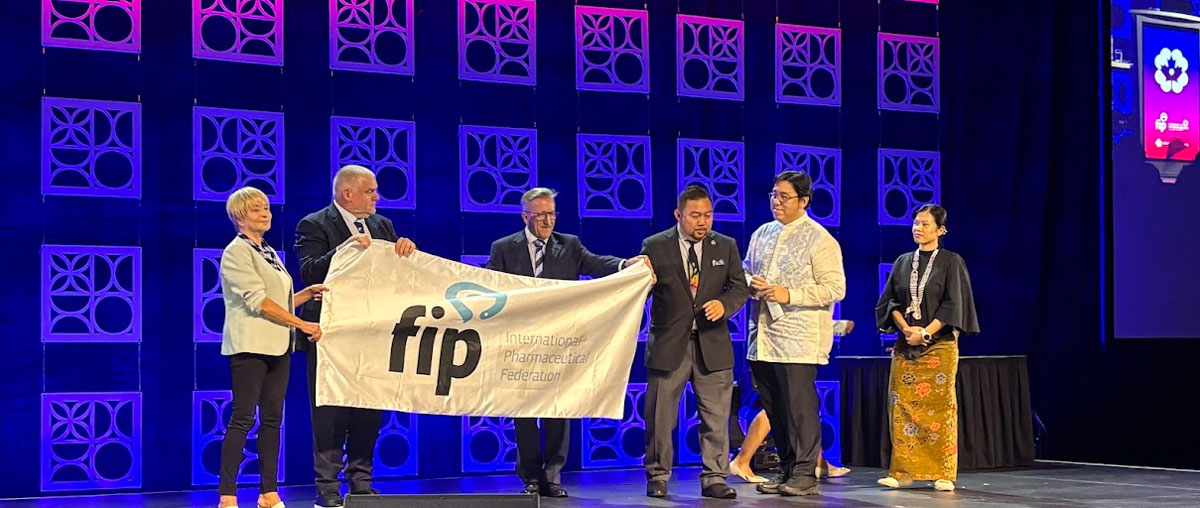 CPhA passes the FIP Flag to Malaysia during the closing ceremony